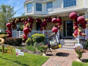 balloon garlands on home exterior