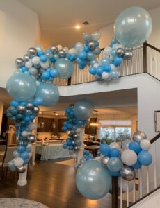blue and white birthday party balloon decor