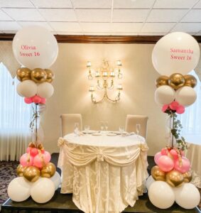 pink and gold sweet 16 birthday balloon columns