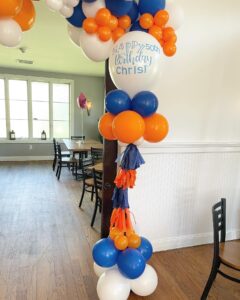 orange and blue birthday balloon garland