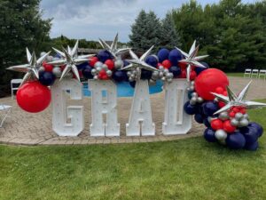 graduation balloon garland with marquee letters