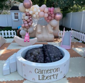 balloon arch on bounce house