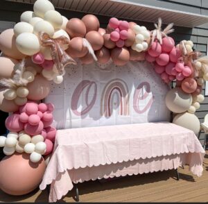 pink first birthday balloon arch