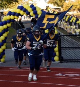 balloon arch at football game