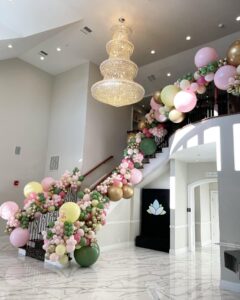 sweet 16 balloons on stairs