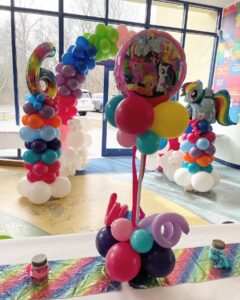 colorful 6th birthday party balloon decor