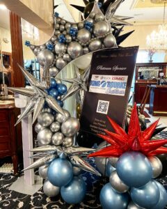 large balloon garland at corporate event