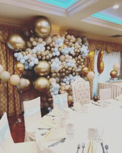 gold, tan, and white sweet 16 balloon backdrop