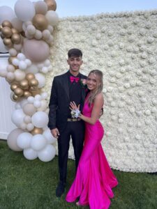 school dance balloon column and rose photo backdrop