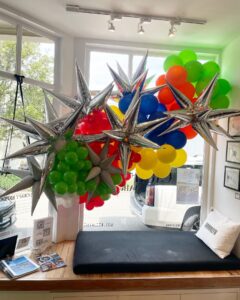 balloon garland in store window