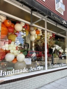 balloon garland in storefront window