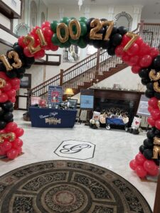 large balloon arch at corporate event